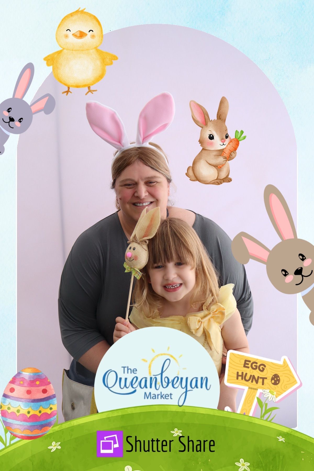Friends enjoying the photo booth at the markets